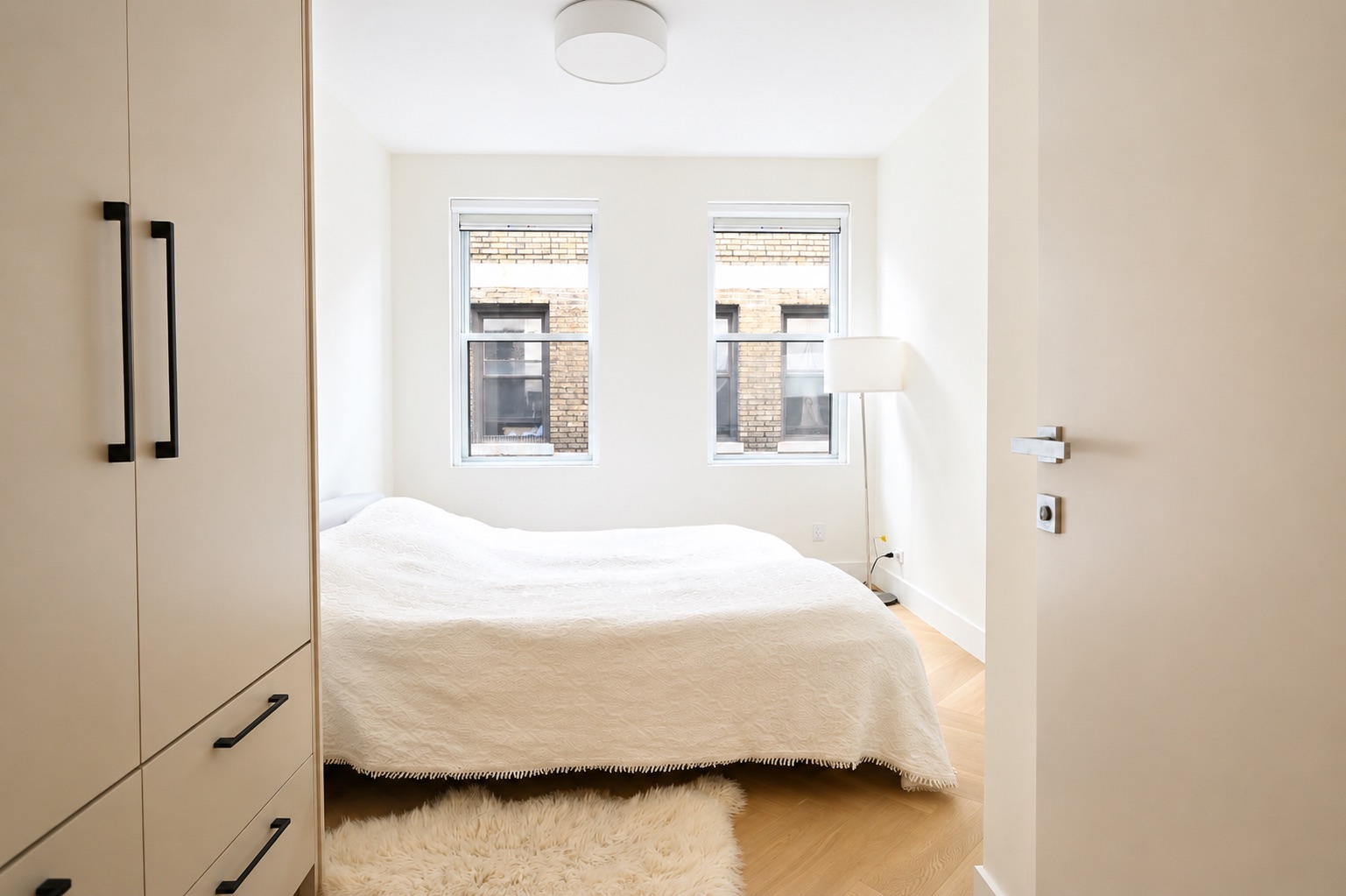 Second bedroom with custom built-in wardrobes